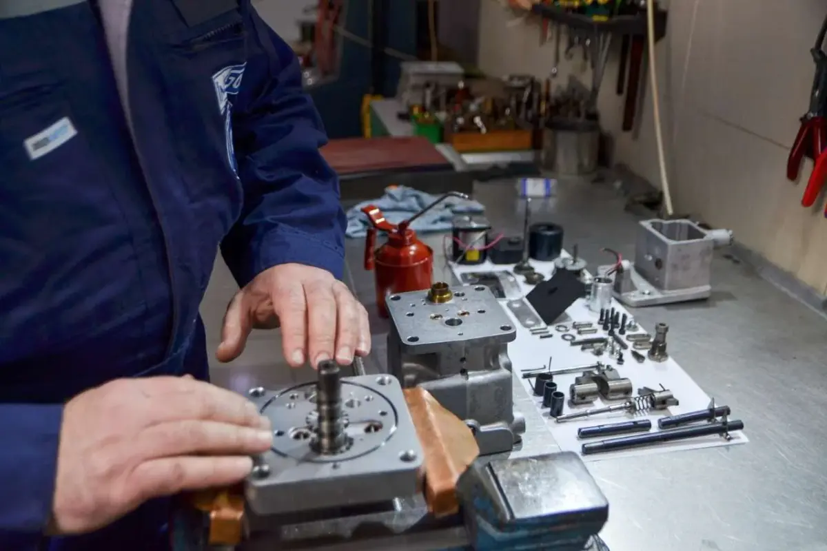 Technician calibrating a marine engine governor